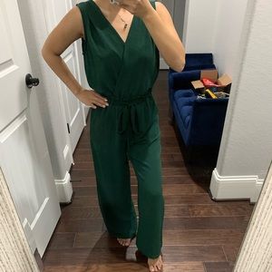 Hunter green jump suit with pocket